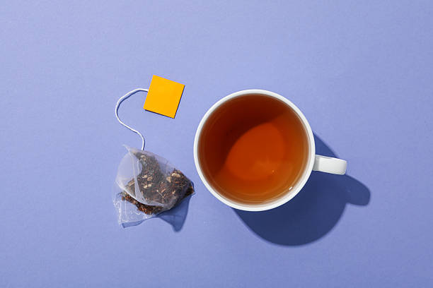 istock Concept of hot drink - tea and tea bag 2242289358