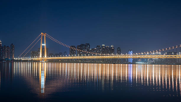 istock Illuminated Bridge over the Yangtze River at Night in Wuhan, China 2242294963