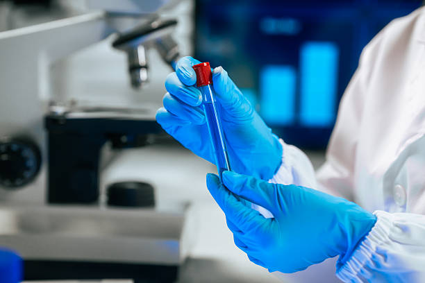 istock An Asian female scientist carefully analyzes microscopic samples and chemical solutions in a modern laboratory, conducting biology, microbiology, pharmaceutical, and medical research with precision 2242299307