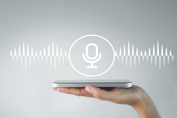 istock Voice Command: Soundwave and Microphone Icon on Smartphone 2242309195