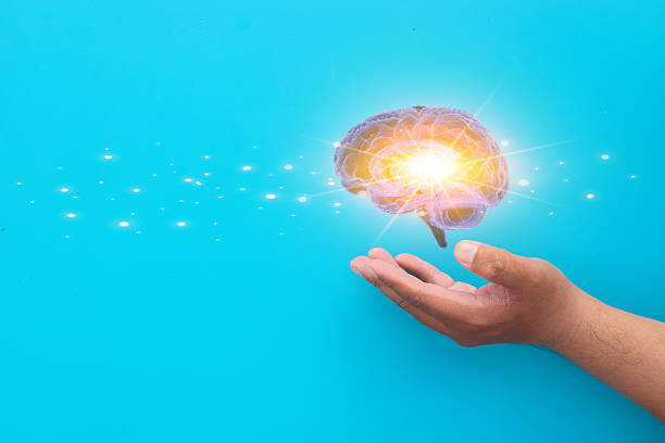 istock Innovation and Creativity: Hand Holding Glowing Brain Icon 2242310888