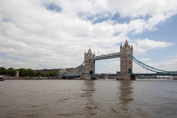 London, United Kingdom - June 21, 2017: Gothic Revival Tower Bridge on River Thames. Bridge is grade I listed combined bascule and suspension