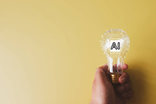 istock AI Innovation Concept: Hand Holding Lightbulb with AI Chip Icon 2242312694