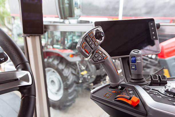 istock The cabin and control stick tractor of a modern tractor 2242314690