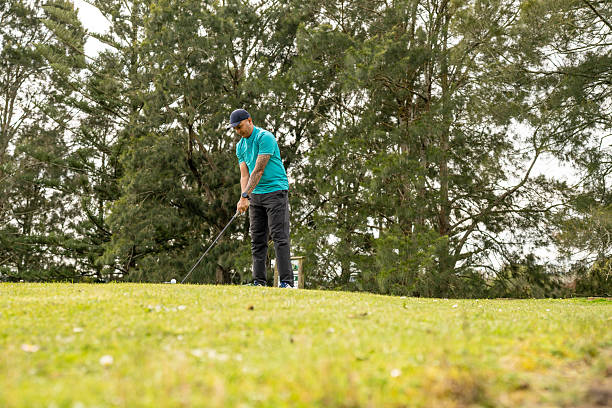 istock Male Golfer Preparing to Tee Off 2242317265