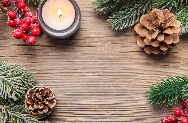 istock Christmas holidays border on rustic wood background 2242318246