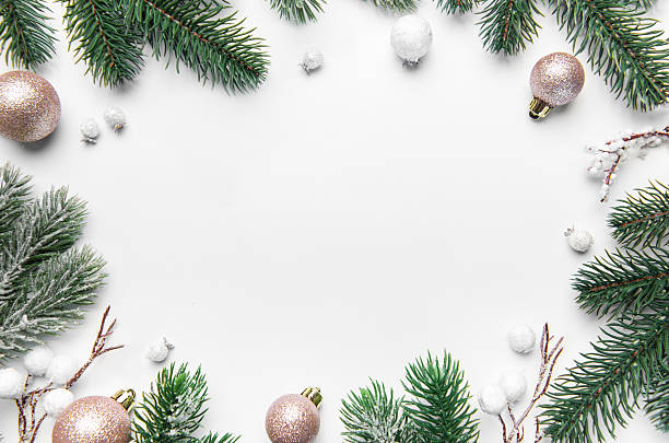 istock Christmas frame with pine branches and ornaments on white background 2242318249