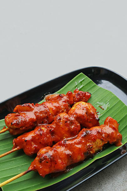 istock Delectable Grilled Marinated Chicken Called Golek Chicken, a Flavorful Famous Southern Thailand Dish 2242319263