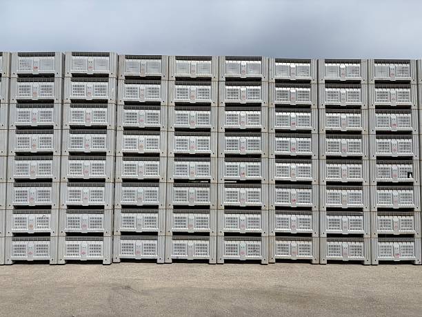 istock A long expanse of industrial plastic crates. 2242319286