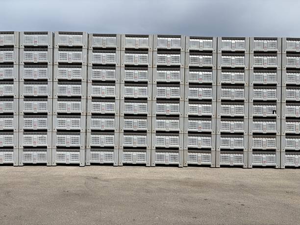 istock A long expanse of industrial plastic crates. 2242319290