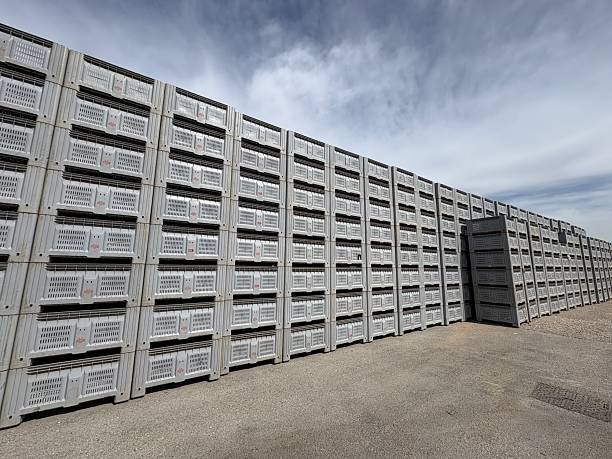 istock A long expanse of industrial plastic crates. 2242319306