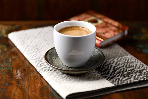 Cup of coffee on rustic wooden background. Soft focus. Copy space.