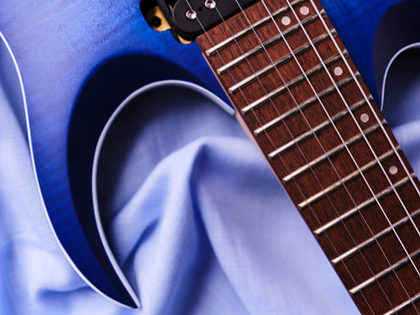 istock Fretboard of modern electric guitar. Close up. 2242323333