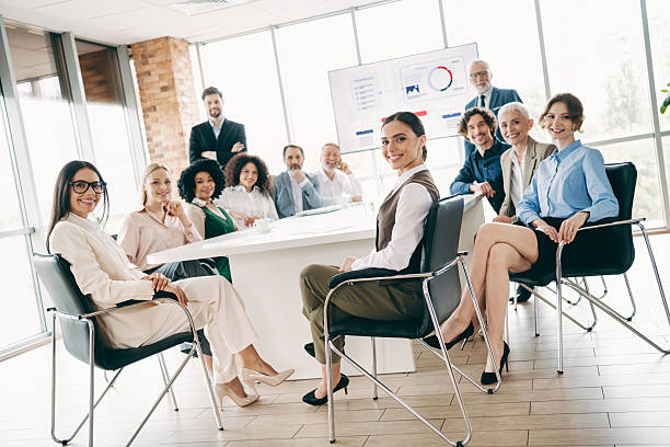istock Professional business team in a modern office having a meeting, discussing progress and teamwork strategies 2242324183