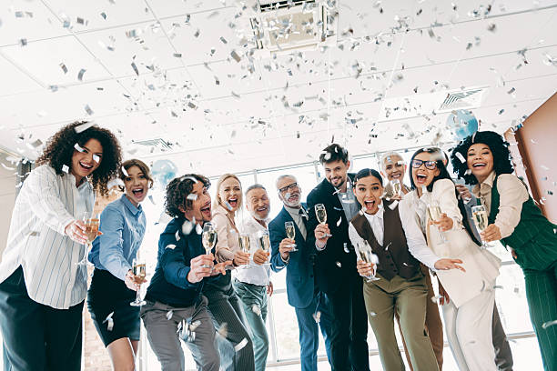 istock Diverse Office Team Celebrating Success at Work Gathering in a Fun and Engaging Indoor Moment of Teamwork 2242324551
