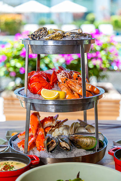 istock Seafood platter served on ice, featuring oysters, lobster, shrimp, 2242326585