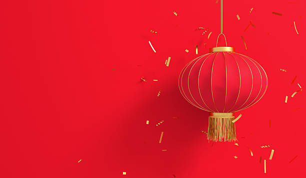 istock Red chinese lantern hanging with gold confetti 2242332595