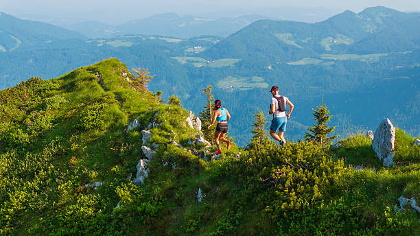 istock Mid Adult Caucasian Runners Navigating Mountain Trails with Determination 2242333132