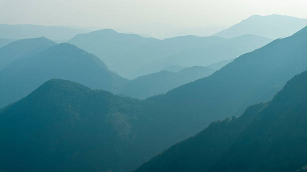 istock Majestic Mountain View with Layered Peaks 2242333158