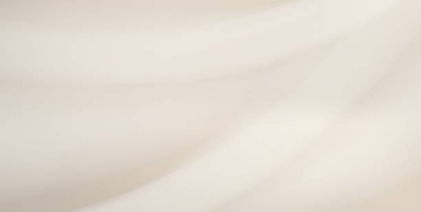 istock Soft beige and golden pearl tones create a realistic smooth background. Perfect setting for showcasing beauty and cosmetic items. Minimalistic design complements neutral interiors and product display shelves. Elegant composition for ads or presentations. 2242334838