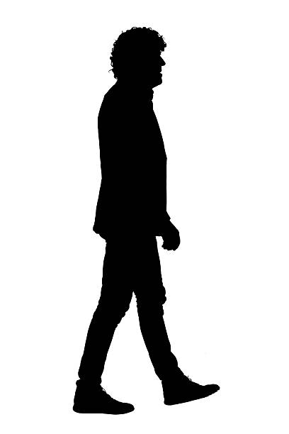 istock silhouette of side view of a man dressed in jacket walking on white background 2242336667