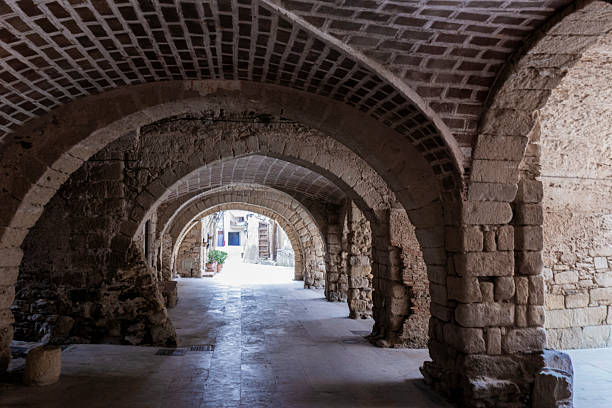 istock Peratallada village stone arches forming covered passage 2242338302
