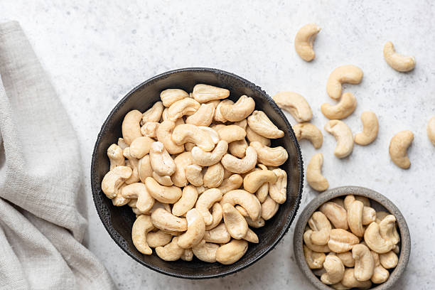 istock Dry cashew nuts in bowl 2242340128
