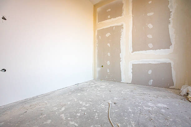 istock Assembled plasterboards on wall of an unfinished edifice on the building site 2242345946
