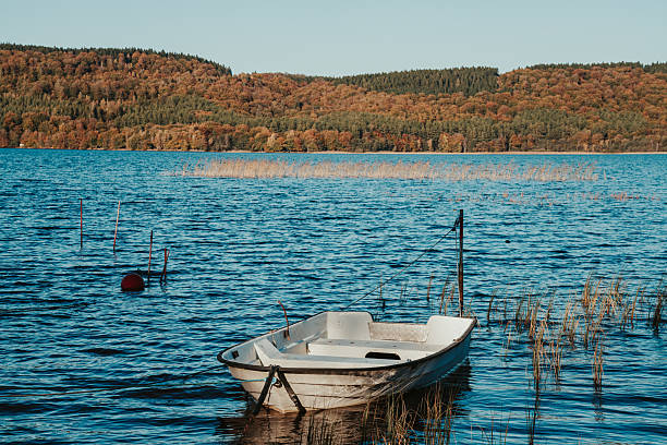 Old boat in Zell am Moos on Irrsee, a lake in the Salzkammergut, Austria that is drained by the Zeller Ache towards the Mondsee