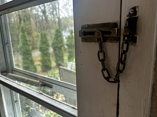An Antique Chain Lock in Door