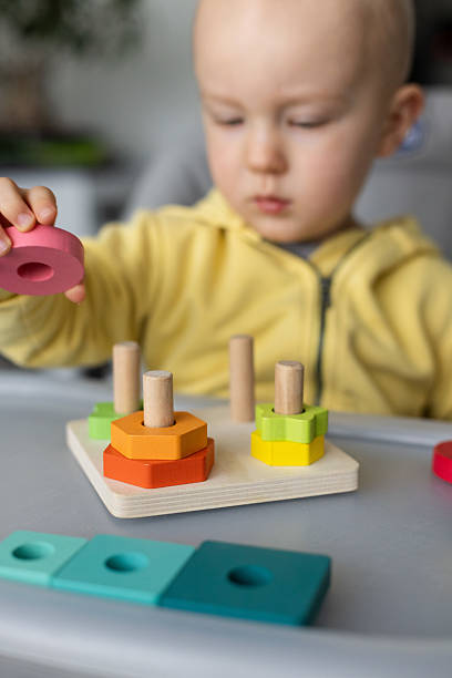 istock Educational toy, Cognitive skills, Montessori activity. Closeup, selective focus. 2242361621