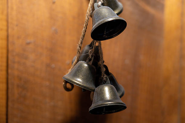 istock Close-up of Brass Bells on Wall 2242369778