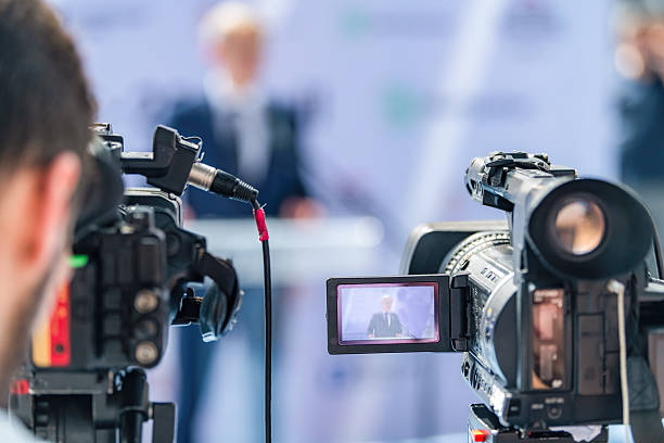 istock Camera at press conference documents vital updates, ensuring precise media records. Its clear footage supports transparent reporting and enhances public confidence in shared information. 2242374886