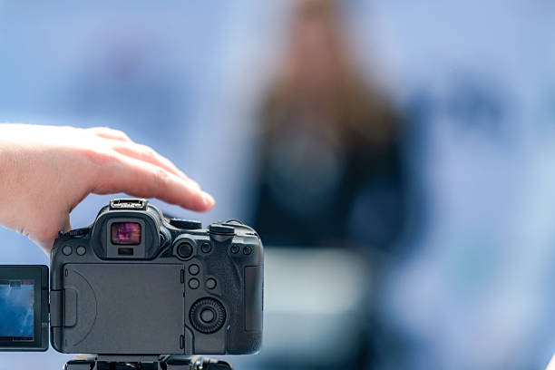istock Camera at an event captures essential updates, aiding reliable documentation. Its high quality visuals promote transparency and enhance public access to trustworthy information. 2242375297