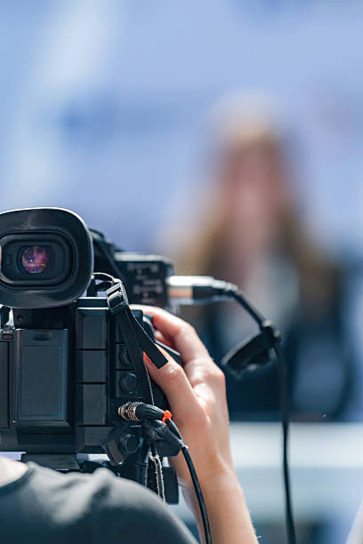 istock Camera at press conference captures vital updates, supporting reliable journalism. Its clear footage enhances public access to trustworthy information with high quality visuals. 2242376398