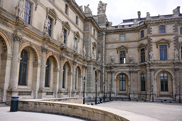 istock Classic stone arches and courtyard of historic Paris building 2242376761