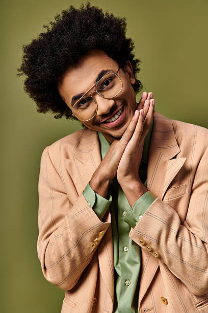 istock Stylish young man expressing emotions in a modern setting with unique fashion 2242385014