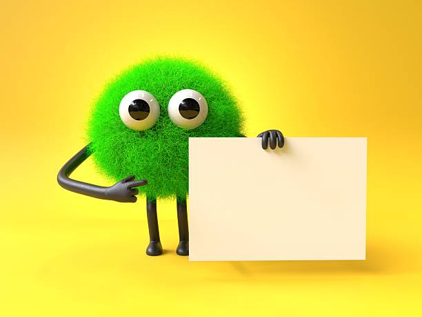 istock Fluffy, cute monster holds a blank sign. 2242389019