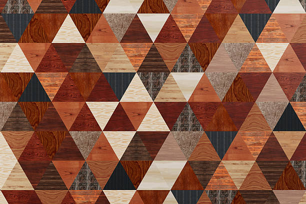 Interior Design Concept. Geometric Pattern Made Of Multicolor Wooden Triangle Tiles Forming A Seamless Surface Background Texture Extreme Closeup
