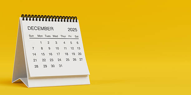 istock White Desk Monthly December 2025 Business Calendar. 3d Rendering 2242395114