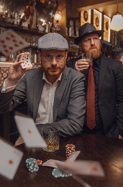 istock Two redhead mafia gangsters in a public bar 2242395459