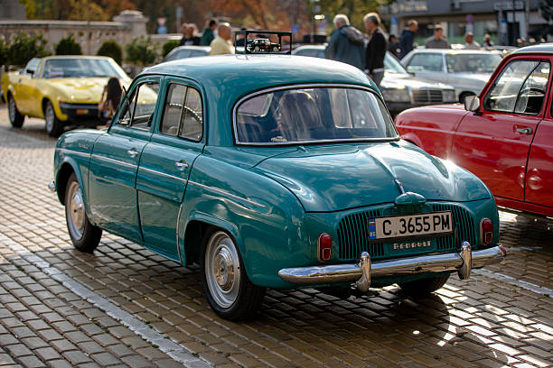 Igualada, Barcelona, Spain; October 1, 2023: Red Renault 4CV (RNUR) classic vehicle exposed on the road. vintage, old