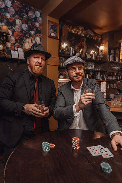 istock Two redhead mafia gangsters in a public bar 2242397844