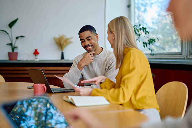 istock Diverse young professionals collaborating during business meeting 2242399066