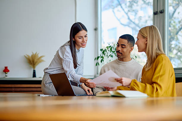 istock Business partners collaborating on financial data in office 2242399289