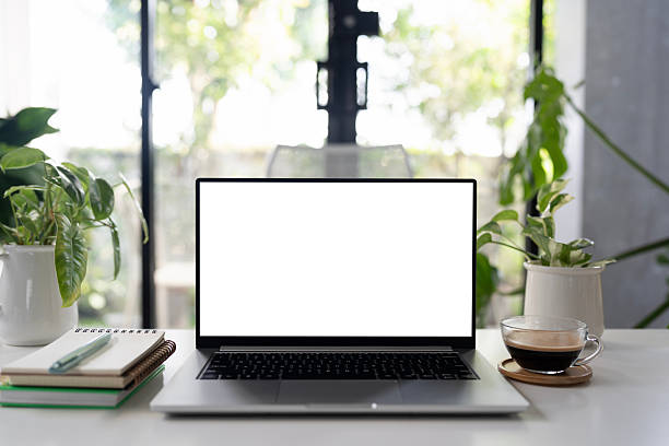 Laptop and coffee during a coffee break, minimal work from home