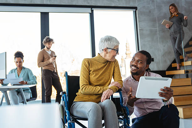istock A bright, contemporary office space with a diverse group of professionals working together 2242404772