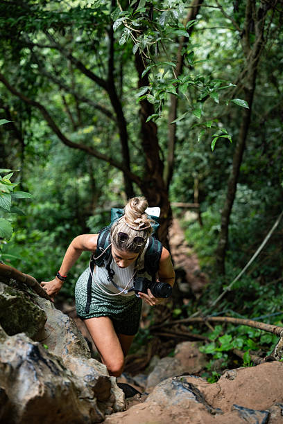 young asian woman enjoy the view at spring mountain peak