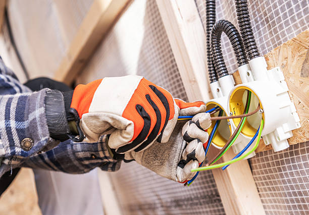 istock Electrician Working With Wires in a Construction Site During Daytime Hours 2242406950
