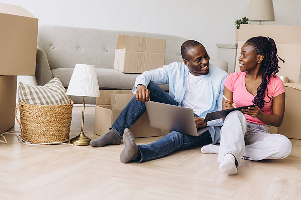 istock African couple planning relocation, moving into new house 2242409196